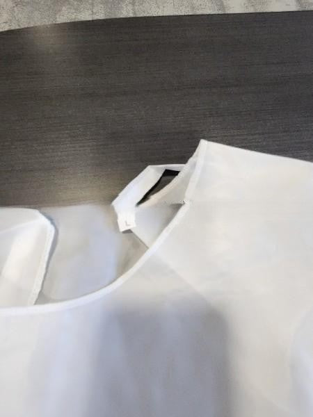 Blouses jetables blanches (9 par paquet) – Protection travaux peinture / nettoyage